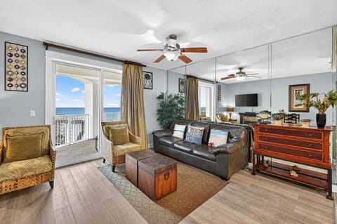 Cozy living room with ocean views and modern decor.