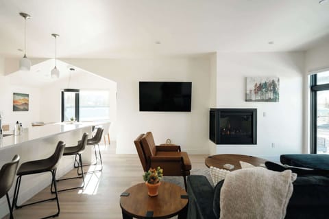 Main living area with smart TV and gas fireplace