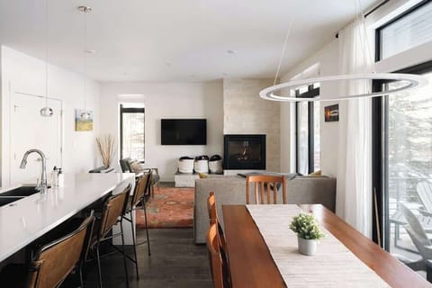 Kitchen, living area, and dining area
