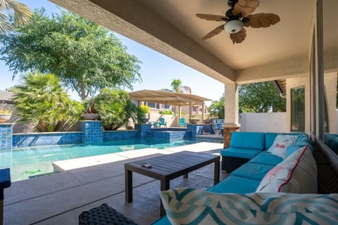 Sip your favorite drink and unwind on the outdoor patio, with the sparkling pool just steps away.