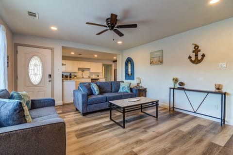 Living room w/ views of kitchen