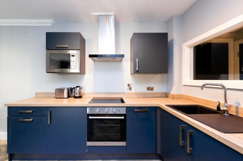 2 Bedroom Apartment | Private kitchen | Fridge, microwave, stovetop, dishwasher