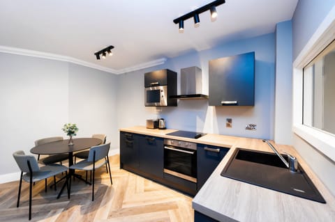 1 Bedroom Apartment | Private kitchen | Fridge, microwave, stovetop, dishwasher