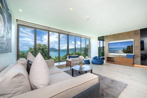 Design Condo, 3 Bedrooms, Sea View | Living area | Flat-screen TV