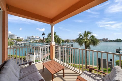 Sip your morning coffee on the covered balcony w/ comfy seating & calming outdoor views.