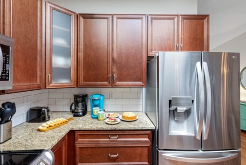 The kitchen is fully equipped with everything you need to prepare and enjoy home-cooked meals during your stay.