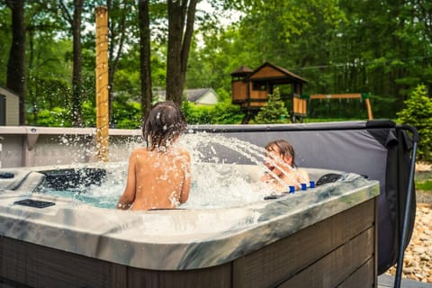Relax and unwind in the spacious hot tub, comfortably seating up to 8 guests — perfect for soaking under the stars!