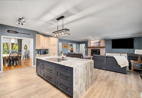 A real open concept living area where you can make family memories! + an 86" TV!