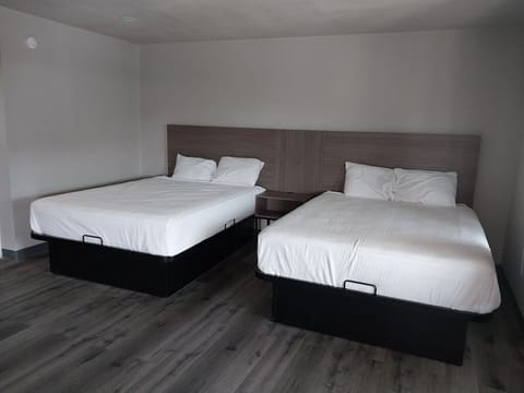 Deluxe Double Room, 2 Queen Beds | Free WiFi, bed sheets