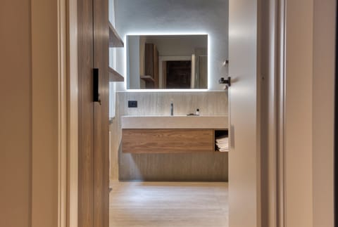 Superior Room | Bathroom | Shower, hair dryer, towels, soap