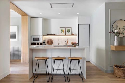 Gather in the large, modern kitchen and prepare gourmet meals together.