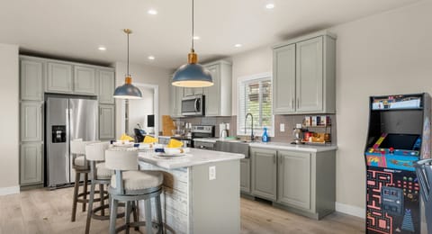 Modern kitchen with stainless appliances, ready for your Bear Lake getaway.