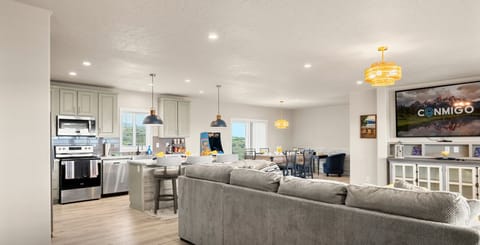 Open layout with living room and kitchen, ideal for group stays.