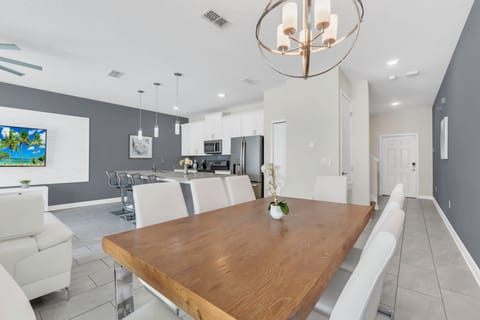 Open-Concept Dining Area with Kitchen View