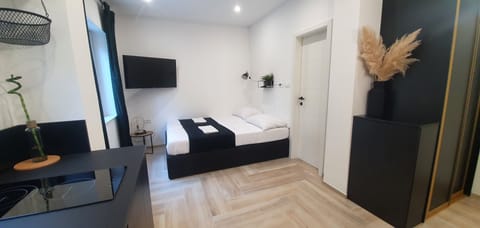 Elegant studio with modern black furniture