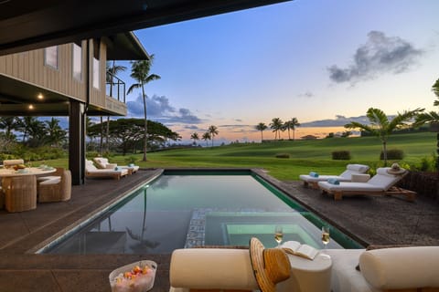 Unwind in the private heated pool and spa as the sun sets over the South Shore horizon.
