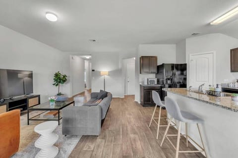 House (4 Bedrooms) | Living area | 43-inch flat-screen TV with cable channels, foosball