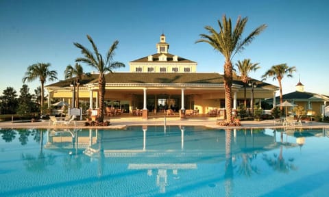 Resort Pool Retreat Near Disney – Spacious Condo w/ Amenities & Tropical Views