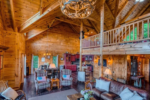 Living Room | Vaulted Ceilings | Stone Fireplace Ambiance