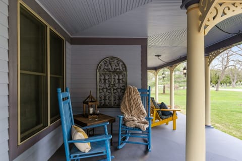 Slow down and soak it all in—rocking chairs on the front porch invite you to relax, sip your favorite drink, and watch the world go by.
