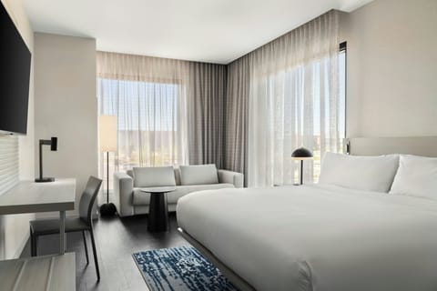 Deluxe Room, 1 King Bed with Sofa bed | In-room safe, blackout drapes, iron/ironing board, travel crib