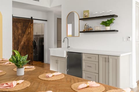 Our stylish wet bar is perfect for mixing up your favorite drinks and unwinding in style.