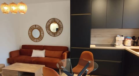 Basic Apartment, City View | Living area | TV