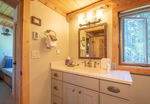 Shower, designer toiletries, hair dryer, bathrobes