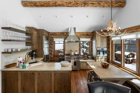 Beautiful kitchen with top of the line appliances, quartz counters, and Dining.