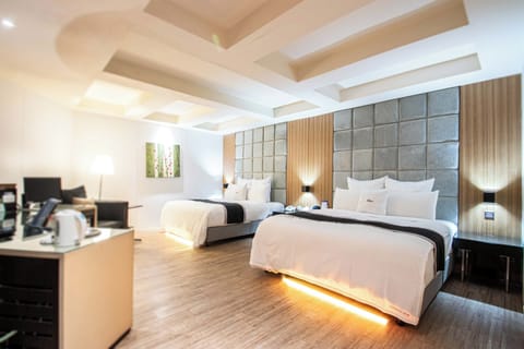 Deluxe Quadruple Room | Premium bedding, minibar, desk, free WiFi