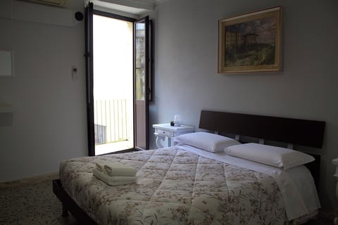 Family Quadruple Room, Balcony, City View | Premium bedding, down comforters