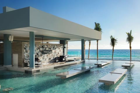 6 bars/lounges, 2 swim-up bars