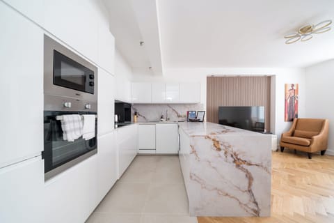 Luxury Apartment, City View | Private kitchen | Coffee/tea maker, electric kettle