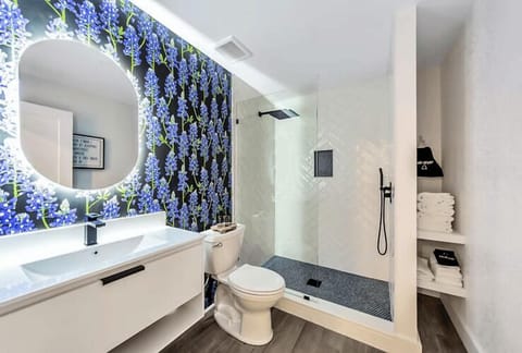 2 Bluebonnet | Bathroom | Shower, rainfall showerhead, hair dryer, towels