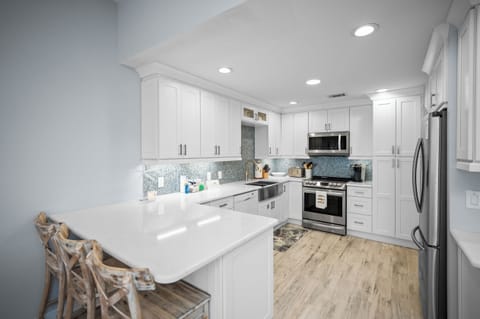 Full Kitchen with all stainless steel appliances.