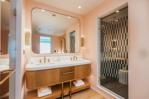 Goodwin Terrace Suite | Bathroom | Designer toiletries, hair dryer, bathrobes, towels
