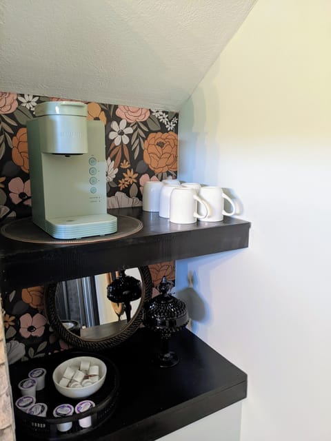 Coffee Pod Bar. Pods and amenities provided.