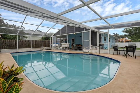 Large private screened-in swimming pool