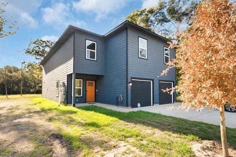 Front entrance, 2 dedicated parking spaces in single side driveway