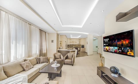 Exclusive Apartment, 3 Bedrooms, Non Smoking, Balcony | Living area | TV