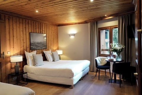 Triple Room, Non Smoking, Mountain View | Minibar, in-room safe, desk, soundproofing
