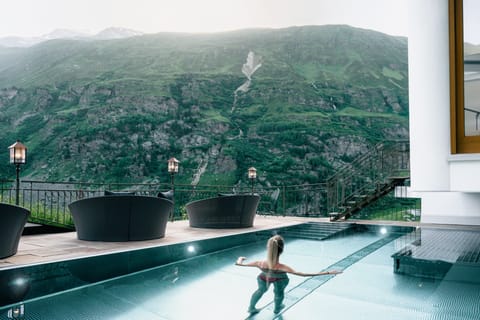 Indoor pool, outdoor pool, pool umbrellas, sun loungers