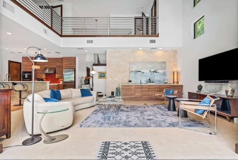 Beautiful wood accents blend perfectly with the white modern walls