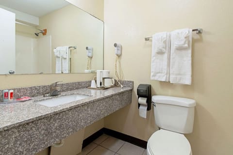 Bathtub, towels, soap, shampoo