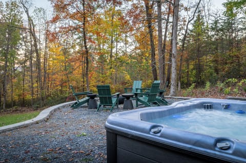 Imagine yourself warming up near the firepit after a relaxing dip in the hot tub.