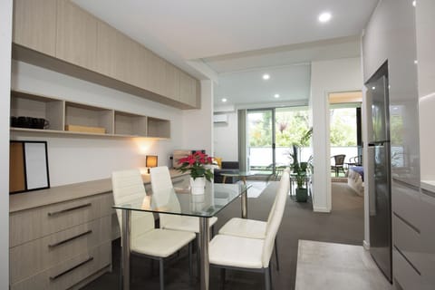 Apartment, 1 Queen Bed | Living area | Flat-screen TV
