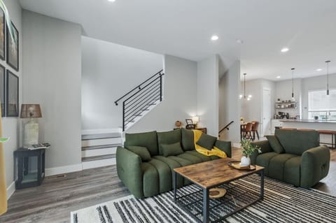 Sink into the plush living room couch and unwind in total comfort.