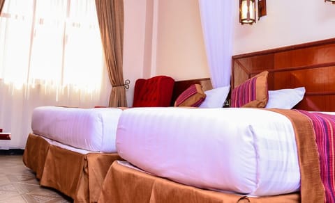 Deluxe Twin Room, City View | Desk, laptop workspace, soundproofing, free WiFi