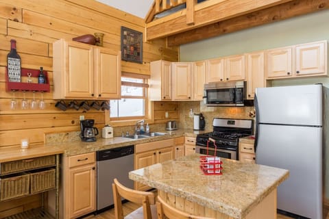 Our kitchen boasts a gas stove and oven. It has all the basics necessary to whip up a meal for 8. We also have a coffee maker, microwave, and toaster.