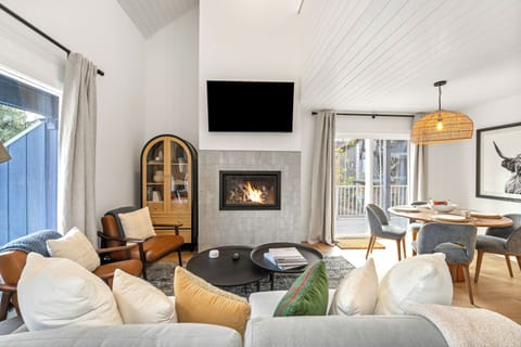 Cozy up by the fireplace and have family movie night | Main Level
